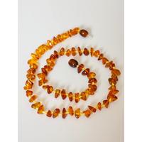 Serbest Naturel Kesim Karamel Kehribar Çocuk Kolye
